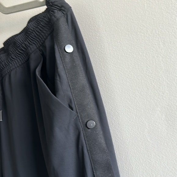 Black track pants with black tuxedo stripe down each leg. - Picture 4 of 4